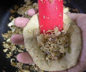 Stuff the bread with the chicken filling - Chicken stiffed bread recipe _ Chicken bafla recipe-Being Rubitah- family recipes