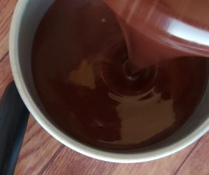 Pour the final mix into the tin- The ridiculously easy chocolate cake with coffee frosting- Being Rubitah- family recipes