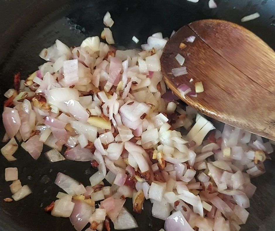 Add onions- spiced pumpkin soup with coconut milk and spinach- Being Rubitah- family recipes